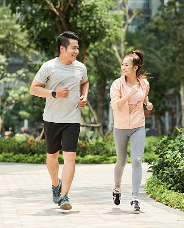 Couple jogging in park